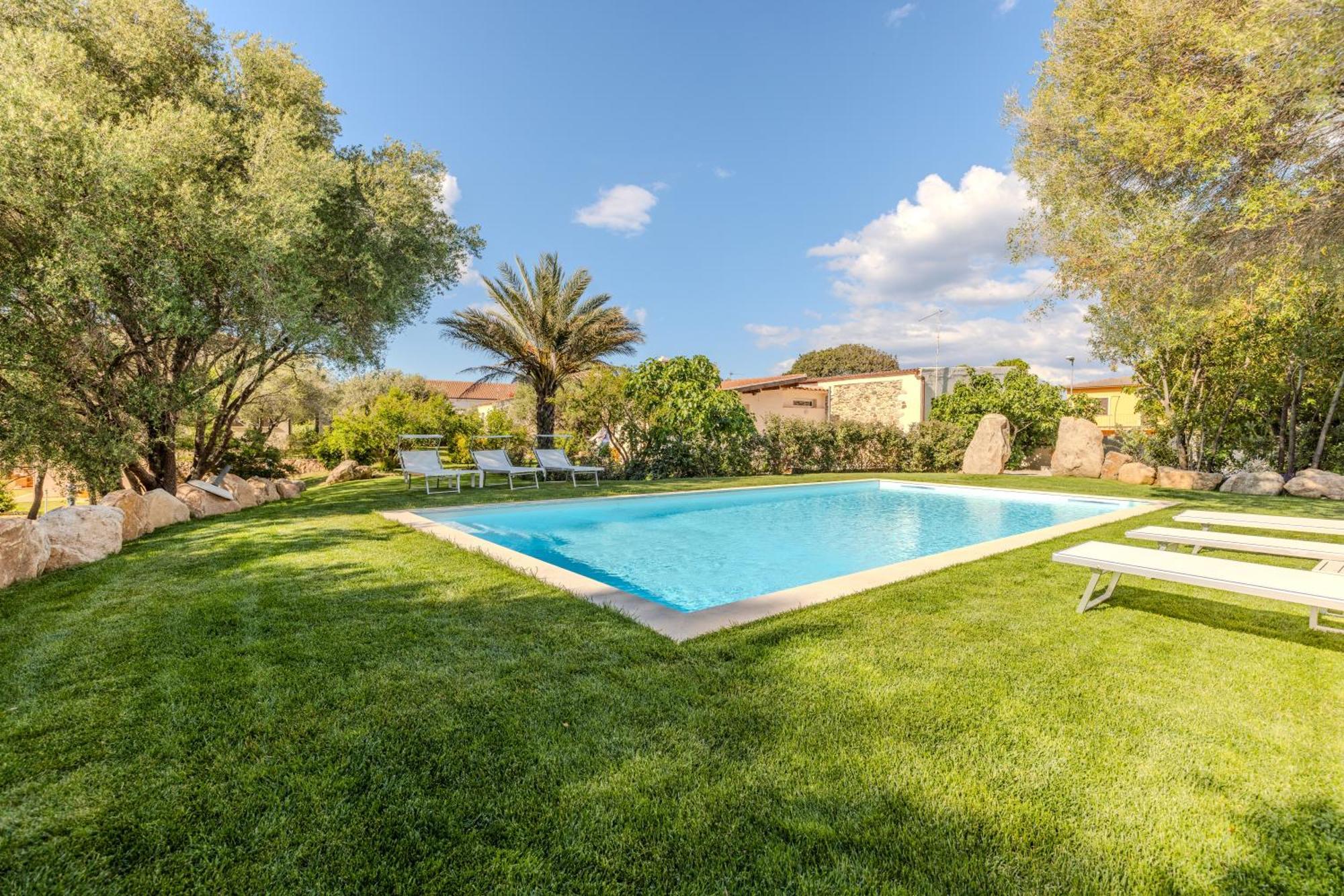 דירות Stazzo San Teodoro La Quercia Piscina Condivisa מראה חיצוני תמונה