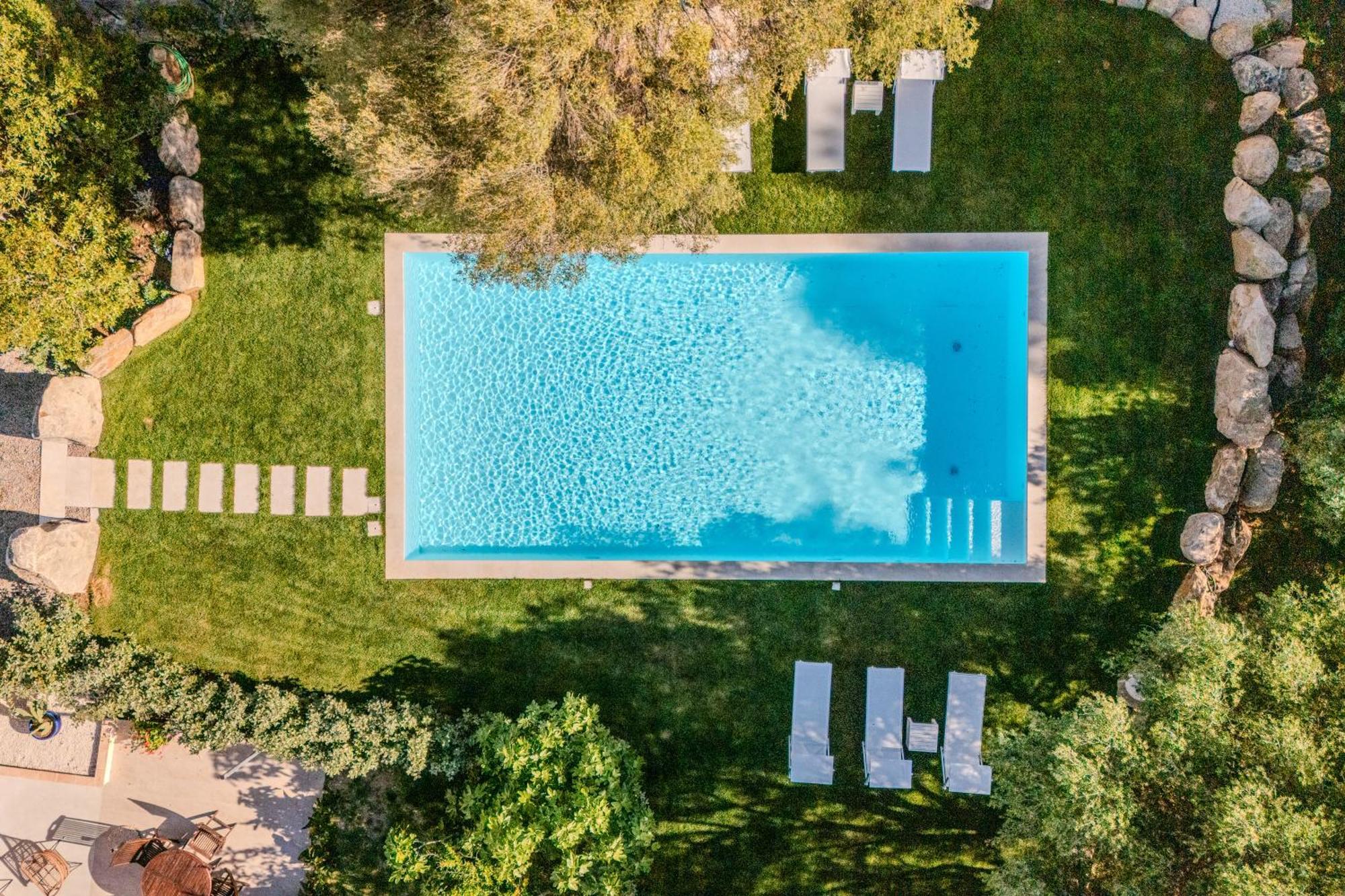 דירות Stazzo San Teodoro La Quercia Piscina Condivisa מראה חיצוני תמונה