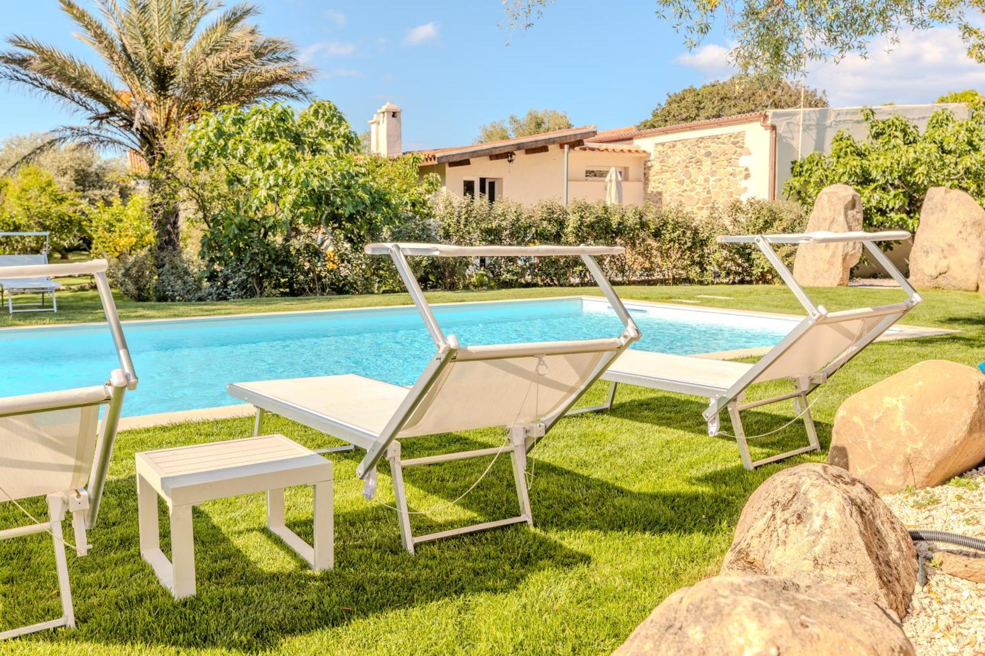דירות Stazzo San Teodoro La Quercia Piscina Condivisa מראה חיצוני תמונה